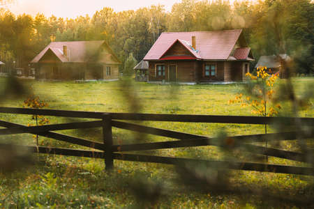 Berezinsky, Biosphere Reserve, Belarus. Traditional Belarusian Tourist Guest Houses In Early Autumn Landscape. Popular Place For Rest And Active Eco-tourism In Belarusの写真素材