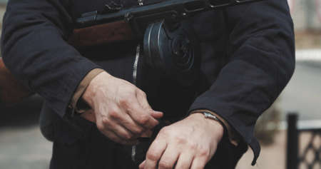 Russian Soviet Crew Member Soldier Of World War II Holding In HandsSub-machine Gun.の写真素材