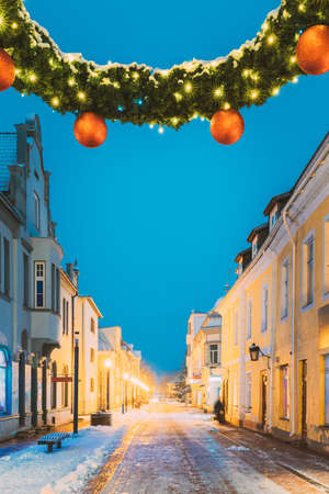 Parnu, Estonia. Night View Of Famous Ruutli Street With Old Buildings, Restaurants, Cafe, Hotels And Shops In Festive Evening Night Christmas Xmas New Year Illuminationsの写真素材