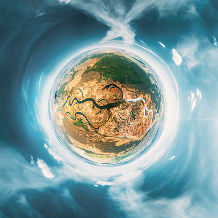 Aerial View Green Forest Woods And River Landscape In Sunny Spring Day. Top View Of Beautiful European Nature From High Attitude. Drone View. Birds Eye View. Little Small Planet Conceptの写真素材