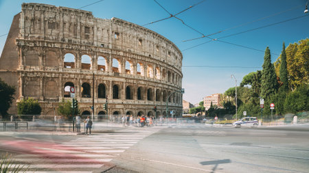 Rome, Italy. Colosseum. Traffic Near Flavian Amphitheatre. Famous World Landmark.