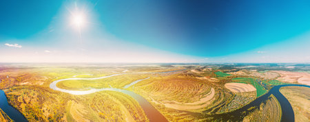 Panorama Aerial View Green Forest Woods And River Landscape In Sunny Spring Summer Day. Sunshine,...