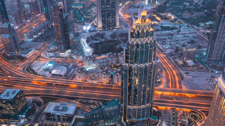 Dubai, UAE, United Arab Emirates. Hyperlaps Day To Night . City Traffic. Elevated View Cityscape Skyline Big City. Skyscraper in Many Light Lighting. Evening to Nightの写真素材