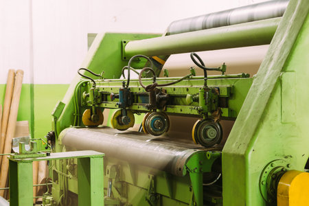 Paper Cutting Machine At Paper Mill. Close Up