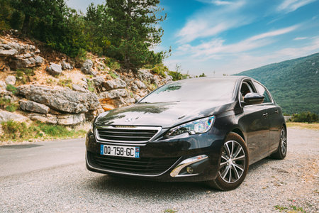 Black colour Peugeot 308 car on background of French mountain nature landscape the Gorges Du Verdon in Franceのeditorial素材
