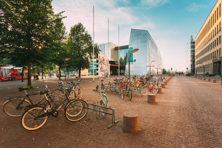 View of Mannerheiminaukio street in Helsinki, Finland. Parked Bicycles On Sidewalk Near Museum of Contemporary Art Kiasmaのeditorial素材