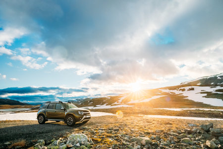 Aurlandsfjellet, Norway. Car SUV Parked Near Aurlandsfjellet Scenic Route Road In Summer Norwegian...