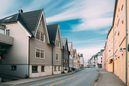Alesund, Norway. Old Wooden Houses In Cloudy Summer Dayのeditorial素材