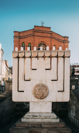 Large Hanukkah Menorah At Entrance To Great Synagogue Of Tbilisi Great Synagogue In Tbilisi, Also Sephardic, Or Synagogue Of Jews From Akhaltsikhe - Main Synagogue Of Jewish Community In City.の写真素材