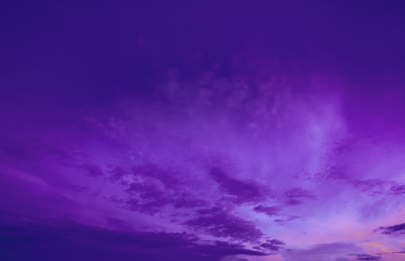 Sky And Fluffy Clouds. Cloudscape Background. Bright Dramatic Cloud Sky In Dark Magenta Colours. Amazing Colorful Pink Clouds. Unusual Abstract Toned Sky Background. Soft Pink, Purple Colors Sunsetの写真素材