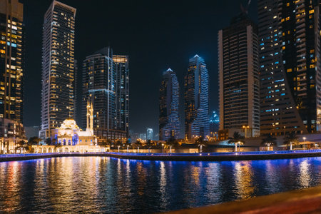 Night View Of Dubai Marina Towers. Dubai Marina Skyline Background. Holidays In United Arab Emirates. Vacation In UAE. Night view of high-rise buildings of residential district in Dubai Marina. Nighttime.の写真素材