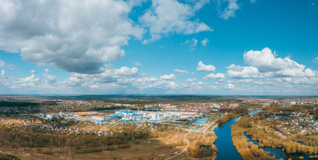 Aerial View Of Modern Paper Factory In Sunny Spring Day. Birds-eye View Of Dobrush Cityscape. Dobrush, Gomel Region, Belarusの写真素材