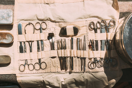 Old Medical And Surgical Instruments. Many Surgical Instruments For Surgery. Old Different Metal Medical Instruments Objects. Retro Stainless Surgical Equipment Toolsの写真素材