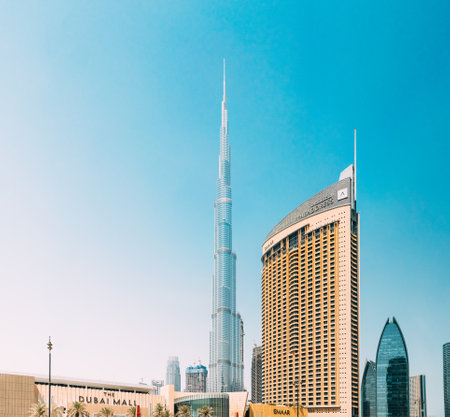 Dubai, UAE, United Arab Emirates - May 28, 2021: View of hotel Address Dubai Marina, Dubai mall and Burj Khalifa against clear sky. View of landmarks of residential district in Dubai Marina. Burj Khalifa, known as the Burj Dubai with a total height of 828のeditorial素材
