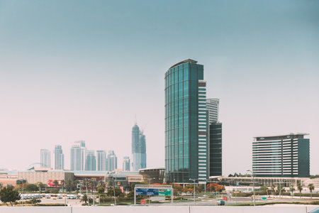 Dubai Marina Port, UAE, United Arab Emirates - May 28, 2021: Hotel InterContinental Dubai Marina, an IHG Hotel. View of high-rise buildings of residential district in Dubai Marina in sunny day. Urban backgroundのeditorial素材