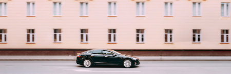 Black Color Tesla Model S Car In Motion On Street. The Tesla Model S Is A Full-sized All-electric Five-door, Luxury Liftback, Produced By Tesla Inc.のeditorial素材