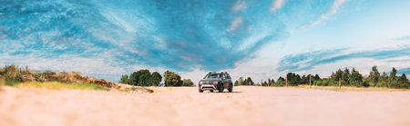 Renault Duster or Dacia Duster SUV in countryside landscape. Duster produced jointly by French...