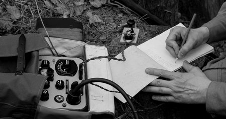 Infantry Army Soldier In World War II using Portable Radio Transceiver In Trench Entrenchment In...