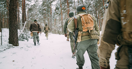 American Infantry Soldier Hard Going Through Forest Road In Cold Winter Day. Squad Usa Soldiers...