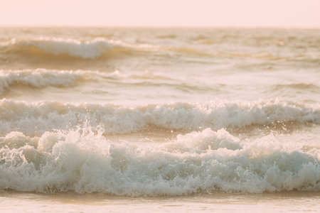 View sea ocean water surface with foaming small waves at sunset. Amazing landscape scenery. Ocean...
