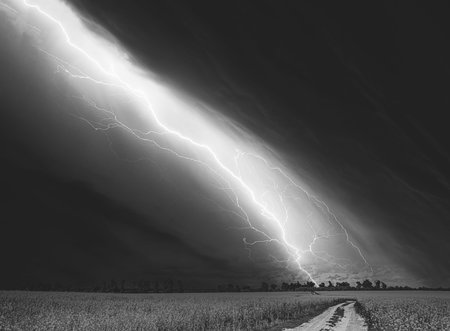 Dramatic Rain Sky With Rain Clouds On Horizon Above Rural Landscape Camola Colza Rapeseed Field....