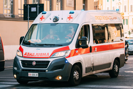 Rome, Italy. Moving With Siren Emergency Ambulance Reanimation Van Fiat Car On Street. Emergency...