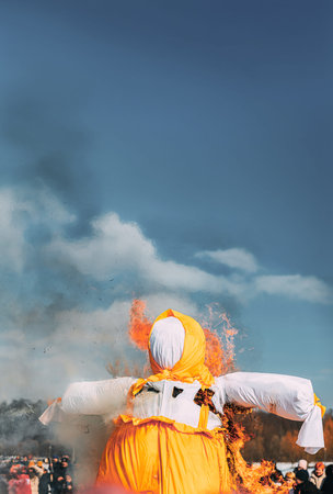 Burning Effigies Straw Maslenitsa In Fire On Traditional National Holiday Dedicated To Approach Of...