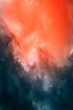 Blue against orange color. Powerful Storm Cloudy Sky With Dark Storm Clouds During Rain Natural Background With Rainclouds. natural weather background dark blue backdrop thunderstorm stormy skyの写真素材