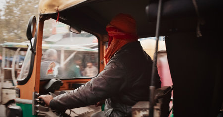 New Delhi, Delhi, India. Traffic On The Desh Bandhu Gupta road street. Cars, Motorcycles, Auto Rickshaw Or Tuk-tuk Moving On Street In morning. View on hotels and shopping placesのeditorial素材
