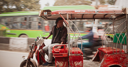 New Delhi, Delhi, India. Traffic On Desh Bandhu Gupta road Street. Auto Rickshaw Or Tuk-tuk Moving in reverse On Street In morningのeditorial素材