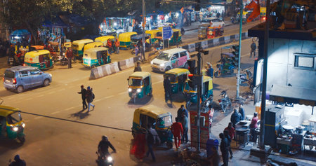 New Delhi, Delhi, India. Traffic On The Main Bazar road Street Paharganj. Cars, Motorcycles, Auto Rickshaw Or Tuk-tuk Moving On Street In night . nightのeditorial素材
