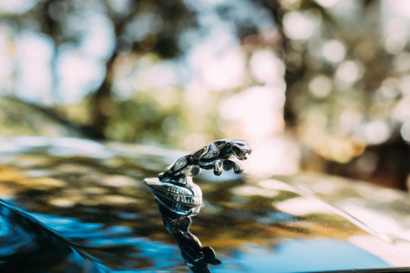 Tbilisi, Georgia. Close Up Of Logo Logotype Sign Of Jaguar XJL XJ on hood. The Jaguar XJ is a series of mid-size full-size luxury cars produced by British automobile manufacturer Jaguar Carsのeditorial素材