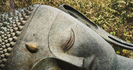 Mumbai, India - February 13, 2024: Close-up View on Bronze Buddha Head Sculpture -sleeping Buddha Or Buddha In Nirvana- In Courtyard Of Chhatrapati Shivaji Maharaj Vastu Sangrahalaya -csmvs- Museumのeditorial素材