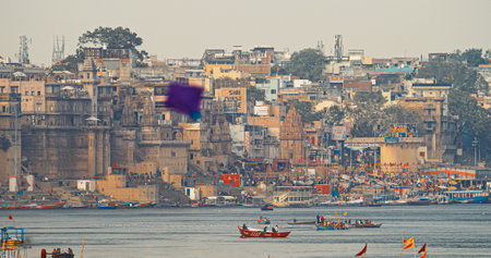 Varanasi, Uttar Pradesh, India. Boats Floating Near Rana Mahal Ghat, Darbhanga Ghat And Dashashwamedh Ghat In Early Morning. Many Hindu Temples. View From Riverbank Embankmentのeditorial素材