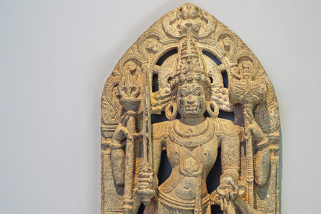 Ancient Statue Of Bhairava Or Kala Bhairava, Is Shaivite And Vajrayana Deity Worshipped By Hindus And Buddhists. Antique Museum Piece Of Hoyasala Period, Karnataka 12th Century Ceの写真素材