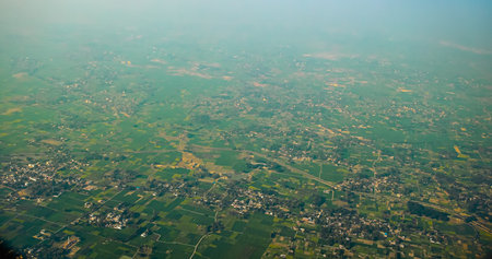 Varanasi, India. Aerial View From Airplane Window On View of the Benares villages. Houses are...
