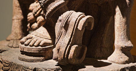 Close-up view on foot of Statue Of Krishna Playing Flute. He Is God Of Protection, Compassion, Tenderness, And Love. Krishna Is Major Deity In Hinduismの写真素材