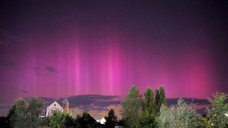 Aurora borealis Amazing Night Starry Sky. Bright Dramatic Perseids meteors Trails Of Stars And Meteors. Sky In Different Colors. From Dusk Till Dawn. Misty Night. Natural Backgroundの写真素材