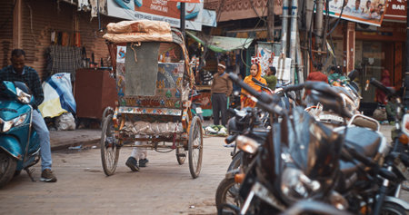 Varanasi, Uttar Pradesh, India. People indian people woman walking in busy street.