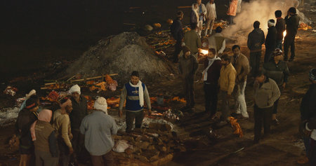 Varanasi, Uttar Pradesh, India. Funeral rites of cremation at the Harishchandra Ghat. Funeral rites...