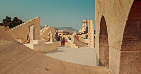 Jaipur, Rajasthan, India. People Tourists Visit To Jantar Mantar. Jantar Mantar, In Jaipur, Is Astronomical Observation Site Built In Early 18th Century. It Includes Set Of Some 20 Main Fixed Instruments. It Features The Worlds Largest Stone Sundial, And のeditorial素材