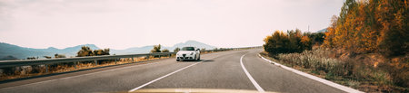 Alfa Romeo Giulietta Car Of White Color In Spanish Motorway.のeditorial素材