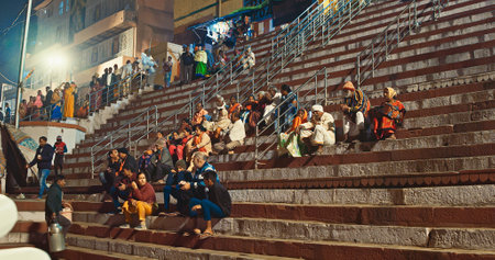 Varanasi, Uttar Pradesh, India. Tourists and locals gather on the steps of the ghat or come in boats to watch the fire ceremony. Ganga Maha Aarti ceremony. traditional ganga aarti at ghat, Varanasi, Uttar Pradesh, India Puja ritual in Varanasi.のeditorial素材