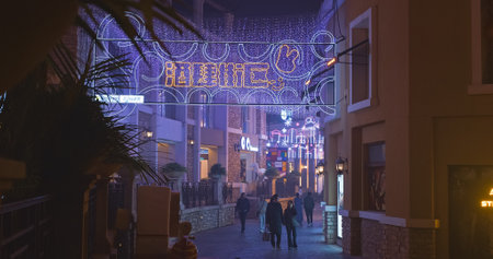 Beijing, China. People Walk Along Narrow Illuminated Streets Of Shopping Mall Solana Shopping Park. Large Shopping Complex. Travel To China. Shopping Travel Concept. Blue Harbor Commercial Facilities Project. Shopping Vacationのeditorial素材