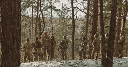 Back View On American Infantry Soldiers standing together At Winter Day. Group Of Usa Soldiers Armed Of Sturmgewehr 44 Or Assault Rifle 44. Usa Army Soldiers Of World War Iiの写真素材
