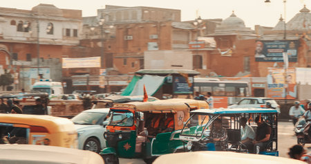 Jaipur, Rajasthan, India. Traffic On Chanpole Bazar Rd. Chhoti Chopad Street During Morning. Traffic In City Street. Tuk-tuk Moving On Street. Early Morning In India. Every Day Life Of Indiaの写真素材