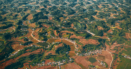 View From Airplane Window On Surroundings Of Chengdu, China. Development Of Agriculture In China. Wooded Terrain Landscape Of China. Porthole View Or Called Bulls-eye Window On Rice Fieldsの写真素材