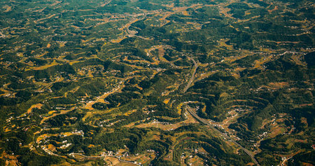 View From Airplane Window On Surroundings Of Chengdu, China. Private Buildings. Mountainous Wooded...