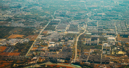 Beijing, China. View From Airplane Window On Multi-story Buildings
