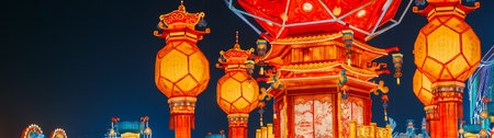 Beijing, China. Palace Lantern Reunion. On Chinese Lantern Festival, People Will Hang Red Lantern, Which Symbolizes Family Reunion. Zigong Lantern Festival In Beijing. Festival In Beijing Garden Expo Park. National Intangible Cultural Heritage Of China. In China Red Is Color Of Sun And Joy. Paper Lantern Is Symbol Of Hearth, Comfort, Kindness. Asian Culture. Panoramaの写真素材